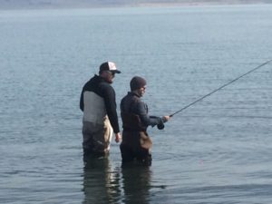 Mike with a guest at Pyramid Lake